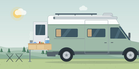 Außenküche als Auszug aus der Heckgarage eines Campervans mit Kocher, Brett und Wasserkanister