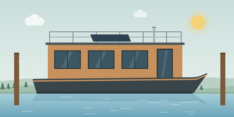 Hausboot auf Stahlkasko mit Holzaufbau und Dachterrasse
